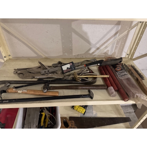 Multiple vice grips, needle nose vice grips, mirrors, safety flares, hammer, alignment pin bar, and 