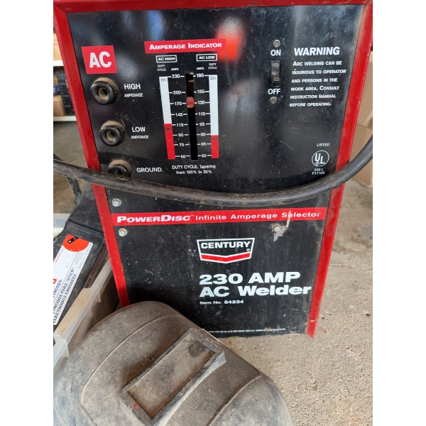 Century 230 Amp AC welder, model 84234, with PowerDisc infinite amperage selector. Includes welder h