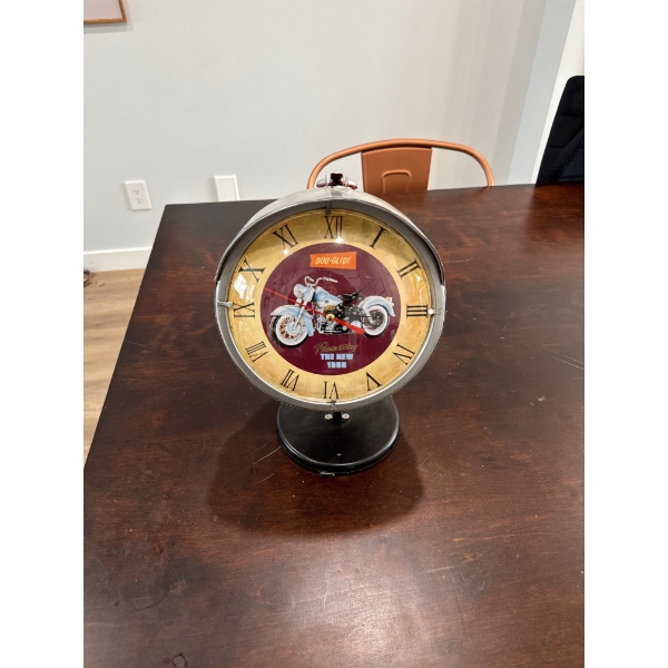  vintage-style Duo-Glide table clock featuring a 1958 Harley-Davidson motorcycle illustration.     D