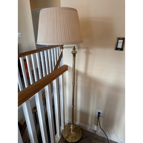 Brass adjustable lamp, 57 inches tall, in working condition