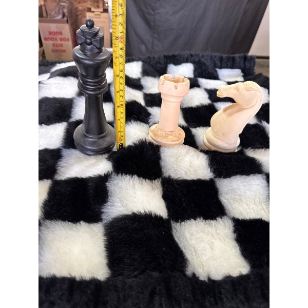 GIANT Hand finished historic chess pieces on luxurious high pile playing rug.