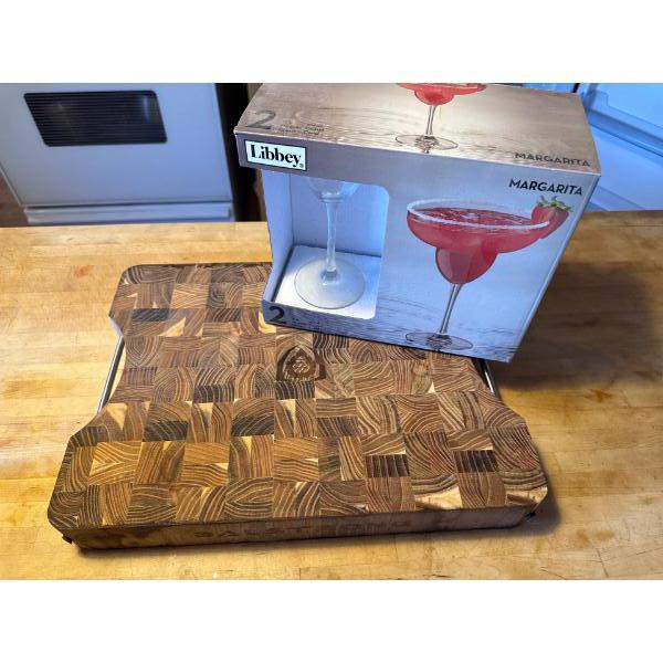 Dalstrong teak wood cutting board, designed for durability and water resistance and a 