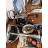 Image 2 : Various hand tools with wood handles such as brace drills, a manual meat grinder, and additional mix
