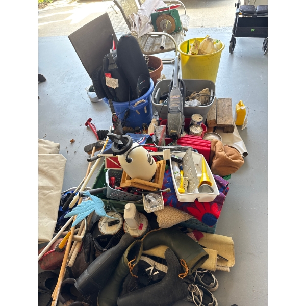 All contents on garage floor, vacuums, Roundup, miscellaneous tools, paint, hand tools, brooms, rubb