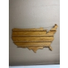 Image 1 :  wooden USA map display rack designed to hold collectibles such as souvenir spoons or wine corks. 