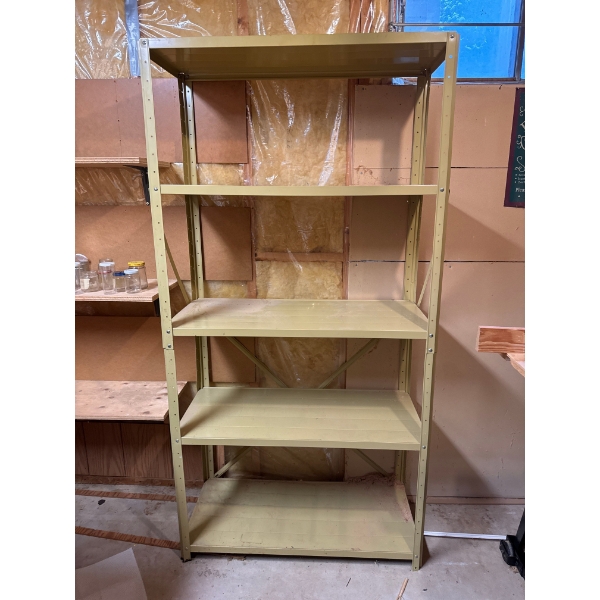  5-tier beige metal shelving unit likely used for industrial or garage storage