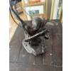 Image 3 : bronze sculpture titled "Starshooter," created by artist Lincoln Fox and often produced by the Fran