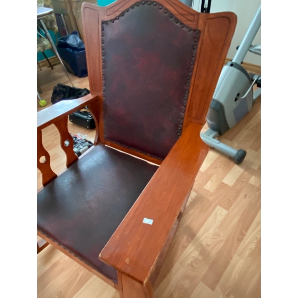  Antique Rocking Chair with cherry leather upholstery and a leather hutch with storage. All contents