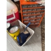Image 6 : Orange plastic drawer organizer, a red and white cooler, two yellow handheld flashlights, a handheld