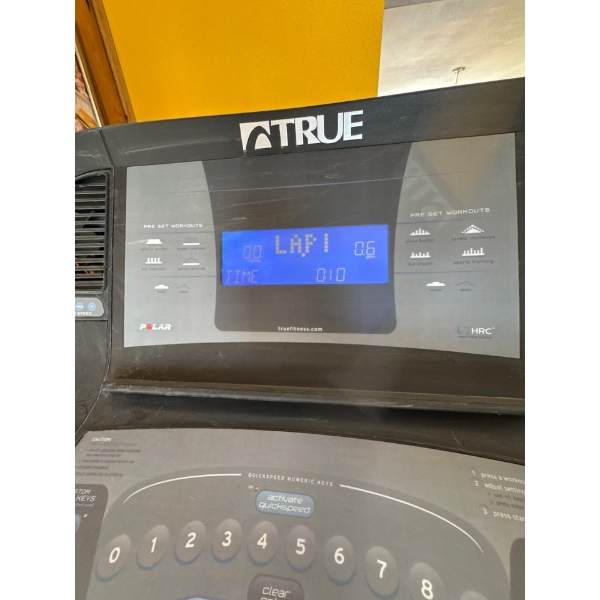TRUE Fitness exercise machine console, specifically likely for a treadmills or recumbent bike based 