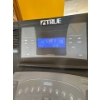 Image 1 : TRUE Fitness exercise machine console, specifically likely for a treadmills or recumbent bike based 