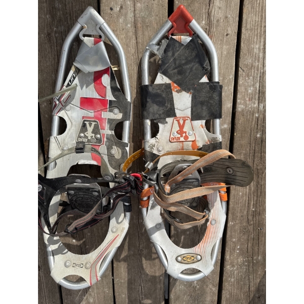 These are a pair of Atlas Run snowshoes, designed specifically for snowshoe running on packed trails