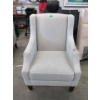 Image 1 : Beige Fabric Upholstered Armchair - Nail Head Detail