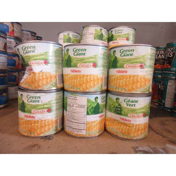 19 Dented Tins of Green Giant Niblets Corn