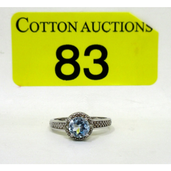 Blue Topaz & Diamond Solitaire Ring