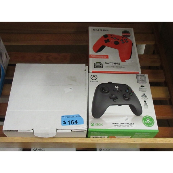 3 Assorted Game Controllers in Boxes