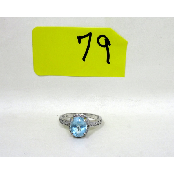 Blue Topaz & Diamond Solitaire Ring