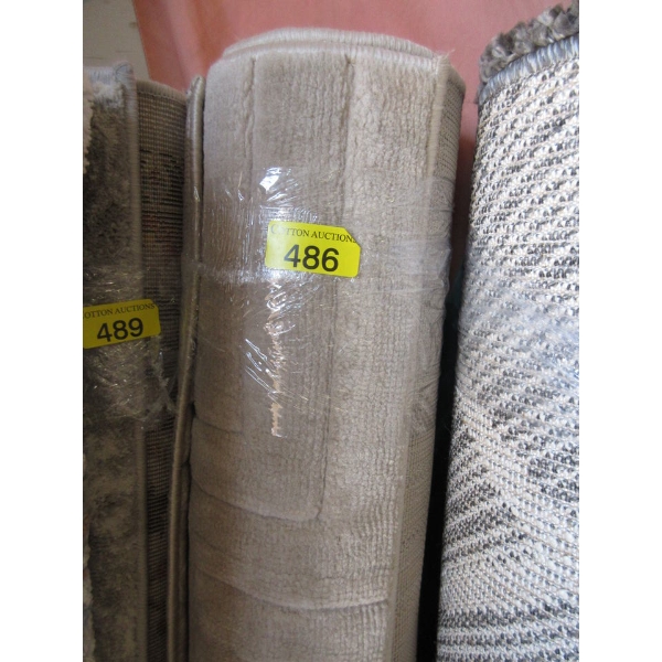 5' x 7' Beige Sculpted Pattern Low Pile Area Carpet