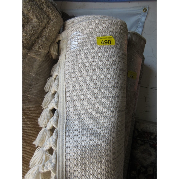 7' x 9' Beige Low Pile Area Carpet with Tassels
