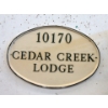 Image 1 : Porcelain "10170 Cedar Creek Lodge" Sign