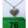 Image 1 : Half Carat Black & White Diamond Heart Pendant 