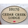 Image 1 : Porcelain "10170 Cedar Creek Lodge" Sign