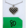Image 1 : Half Carat Black & White Diamond Heart Pendant 