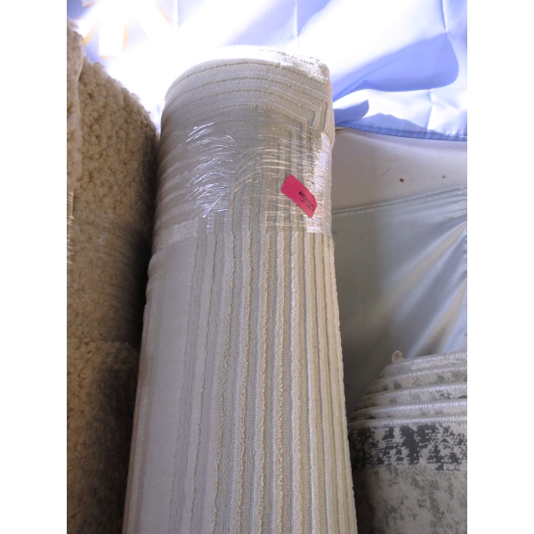 8' x 10' Ivory Sculpted Patterned Low Pile Area Carpet