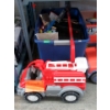 Image 1 : Fire Truck and Tote of Assorted Customer Returns