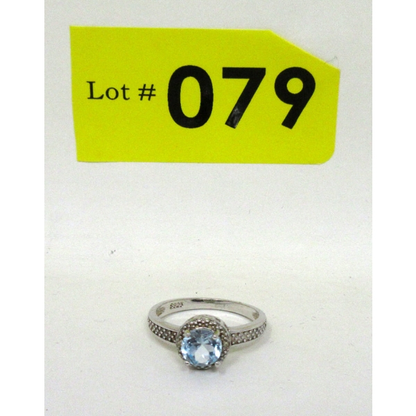 Blue Topaz & Diamond Solitaire Ring
