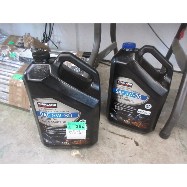 1 Full & 1/2 Full Jug of Kirkland 5W-30 Motor Oil