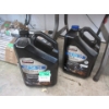 Image 1 : 1 Full & 1/2 Full Jug of Kirkland 5W-30 Motor Oil