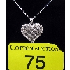 Image 1 : Half Carat Black & White Diamond Heart Pendant 