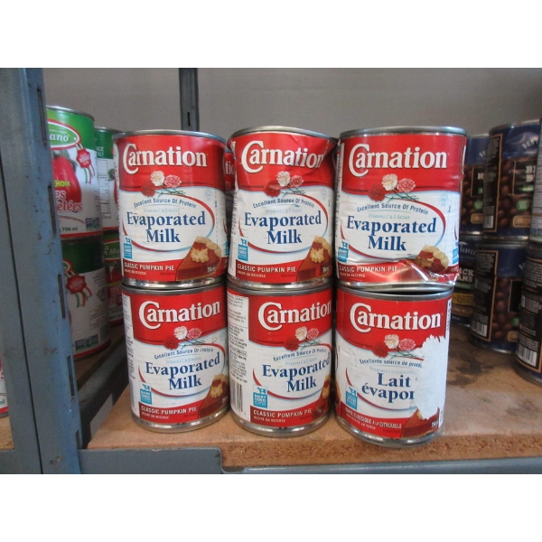 18 Tins of Carnation Evaporated Milk- Dented Cans