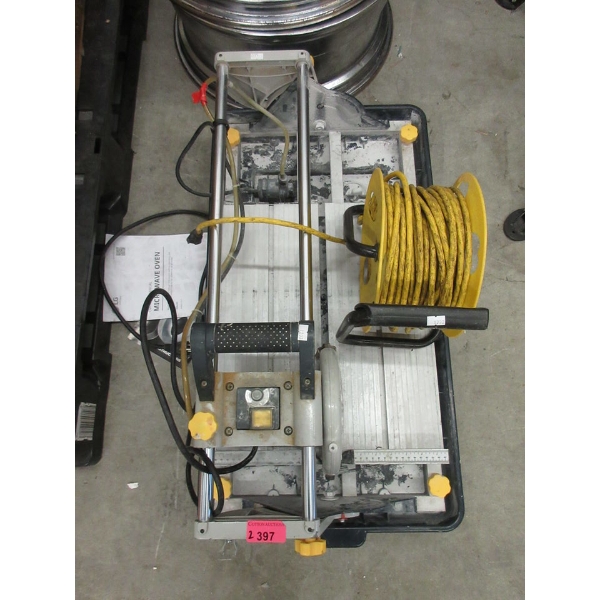 Electric Tile Saw and Extension Cord on Reel