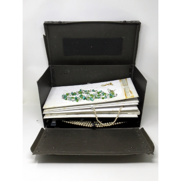 Assorted Sample Jewelry on Pads in Salesman's Case