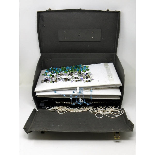 Assorted Sample Jewelry on Pads in Salesman's Case