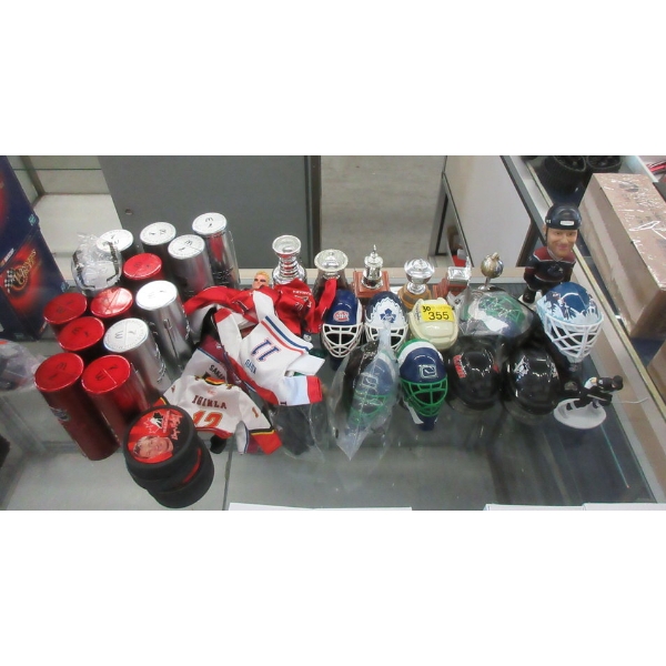 30 Hockey Pucks, Mini Helmets, and Star Sticks