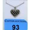 Image 1 : Half Carat Black & White Diamond Heart Pendant 