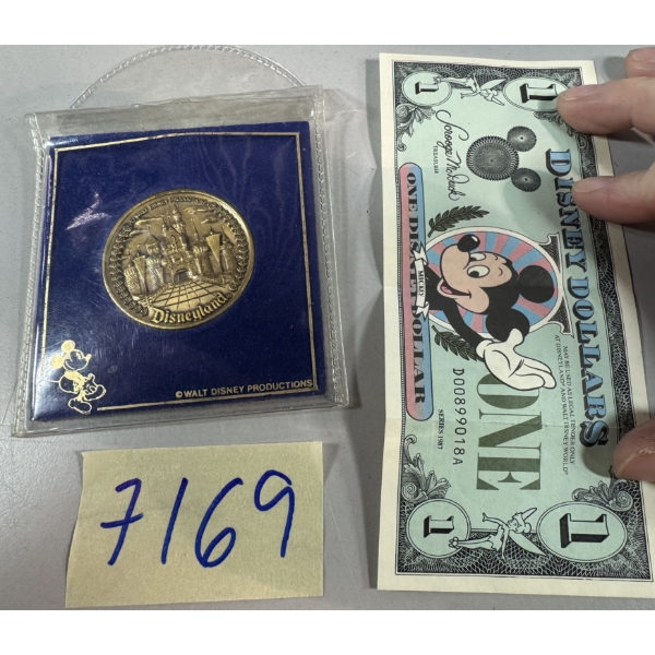 Disney coin and once dollar Mickey Mouse