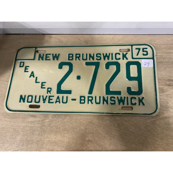 1975 NB DEALER LICENSE PLATE - NEW