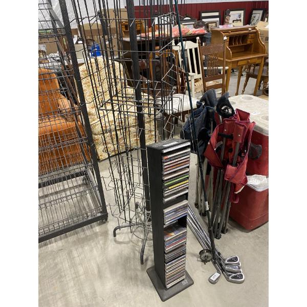 CD STAND WITH CDS AND A MOVIE RACK