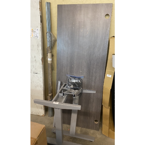 72 INCH ADJUSTABLE DESK - LOOKS TO BE ALL THERE- MAYBE FEW SCREWS MISSING 