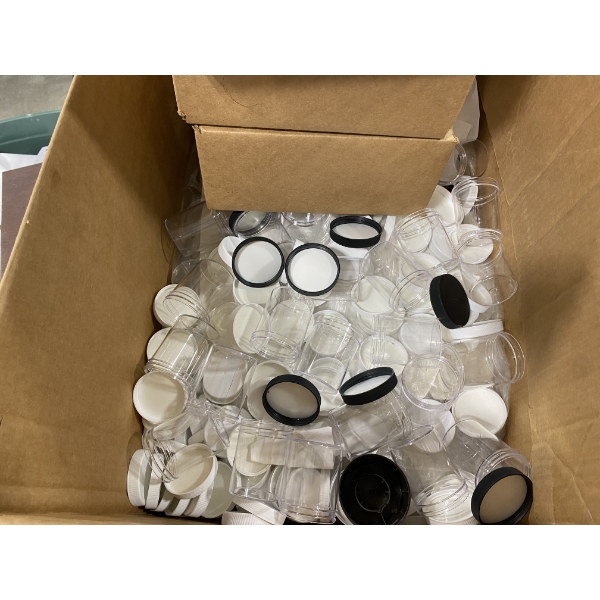 APROX. 200 SMALL PLASTIC JARS WITH COVERS