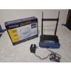 Image 1 : LONG-RANGE ACCESS POINT REPEATER AND LINKSYS WIRELESS WIFI UNIT
