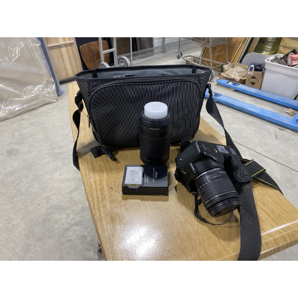 NIKON  CAMERA WITH LENSE AND BATTERIES