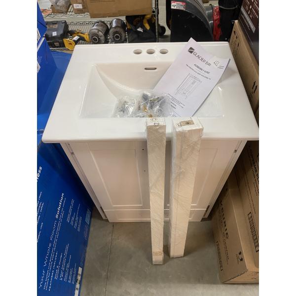 24 INCH VANITY - VERY SMALL NIC ON BACK- WOULD BE HIDDEN 