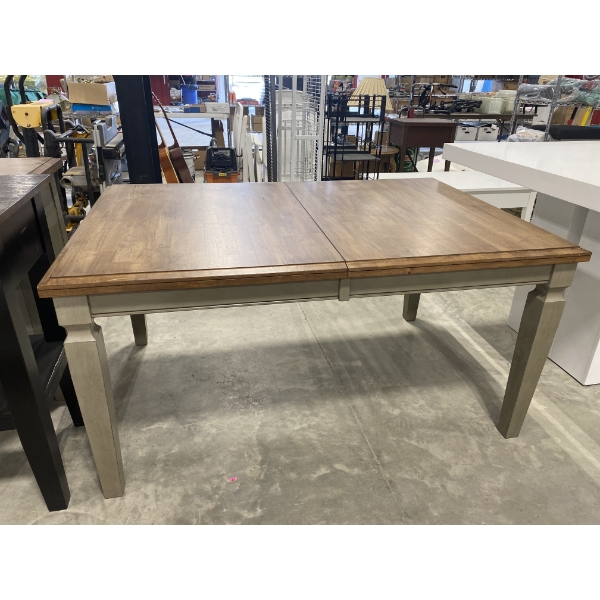 60IN X 40IN SOLID TABLE WITH LEAFS- HAS VERY SMALL HAIRLINE CRACK ON EDGE