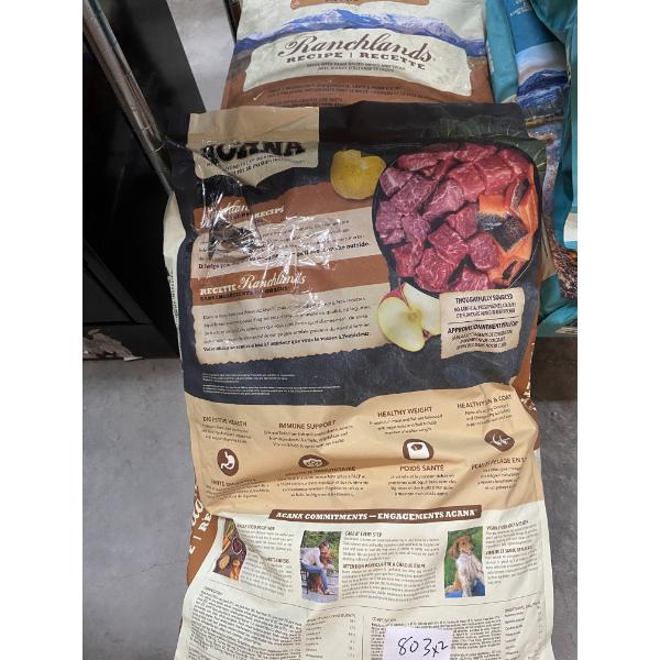 TWO LARGE BAGS OF DOG FOOD