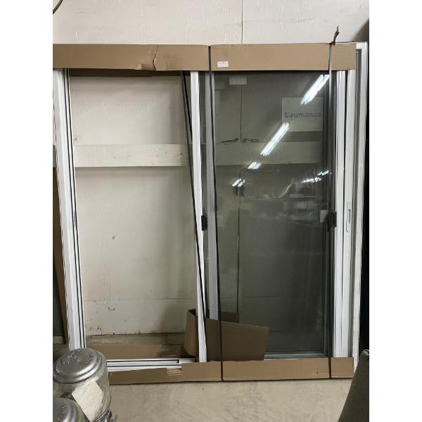 72 INCH SLIDING PATIO DOOR -SCREEN HAS COUPLE HOLES